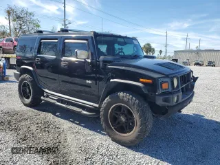 2005 Hummer H2 SUV z VIN 5GRGN23U55H109975, wystawiony jako Copart lot #42739655 z przebiegiem 257 578 mil mil oraz Czysty tytuł • Clean title. Historia ofert i sprzedaży dostępna na DreamBid. Obrazek 4.