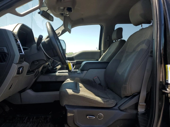 2015 Ford F-150 XLT with VIN 1FTEW1EG7FFA43224, listed as a Copart auction lot 54831665 with 265,723 mi miles and Salvage title. Bid and sale history available at DreamBid. Image 7.