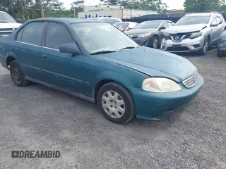 1999 Honda Civic VP z VIN 2HGEJ6610XH595123, wystawiony jako IAAI lot #41880019 z przebiegiem 312 067 mil mil oraz . Historia ofert i sprzedaży dostępna na DreamBid. Obrazek 1.