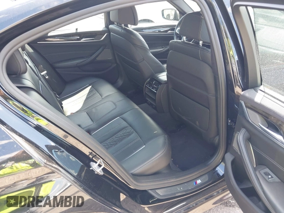 2019 BMW 5 Series M550i xDrive with VIN WBAJB9C51KB289355, listed as a IAAI auction lot 41867984 with 30,106 mi miles and . Bid and sale history available at DreamBid. Image 8.