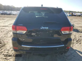 2017 Jeep Grand Cherokee Overland with VIN 1C4RJFCT3HC755960, listed as a Copart auction lot 52268895 with 99,998 mi miles and Salvage title. Bid and sale history available at DreamBid. Image 6.