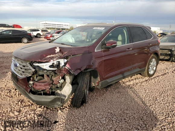 2019 Ford Edge Titanium with VIN 2FMPK4K96KBB80142, listed as a Copart auction lot 84847814 with 75,602 mi miles and Salvage title. Bid and sale history available at DreamBid. Image 1.