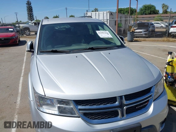 2014 Dodge Journey SXT z VIN 3C4PDDBG8ET212188, wystawiony jako IAAI lot #42101266 z przebiegiem 101 553 mil mil oraz . Historia ofert i sprzedaży dostępna na DreamBid. Obrazek 12.