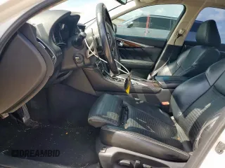 2015 Infiniti Q50 Sport with VIN JN1BV7AP5FM346998, listed as a Copart auction lot 61992655 with 105,215 mi miles and Salvage title. Bid and sale history available at DreamBid. Image 7.