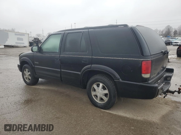 2000 Oldsmobile Bravada z VIN 1GHDT13W5Y2311819, wystawiony jako Copart lot #44839145 z przebiegiem 163 427 mil mil oraz Tytuł czysty. Historia ofert i sprzedaży dostępna na DreamBid. Obrazek 2.