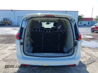 2022 Chrysler Pacifica Touring L with VIN 2C4RC1BGXNR233654, listed as a IAAI auction lot 42137632 with 73,899 mi miles and . Bid and sale history available at DreamBid. Image 6.