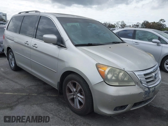2008 Honda Odyssey Touring with VIN 5FNRL38908B058867, listed as a IAAI auction lot 42126471 with 201,088 mi miles and . Bid and sale history available at DreamBid. Image 1.