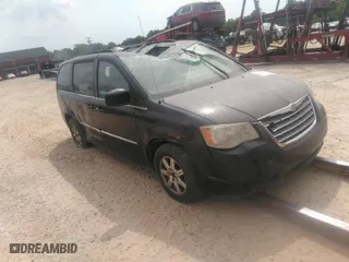 2009 Chrysler Town & Country Touring with VIN 2A8HR54169R574381, listed as a IAAI auction lot 41524129 with 214,282 mi miles. Bid and sale history available at carsss.com. Image 1.