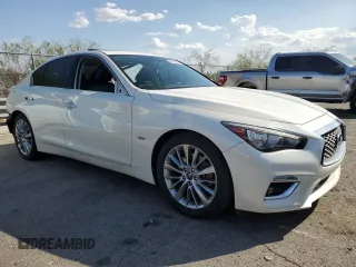 2019 Infiniti Q50 Luxe with VIN JN1EV7AP2KM515513, listed as a Copart auction lot 59893895 with 124,644 mi miles and Salvage title. Bid and sale history available at DreamBid. Image 4.
