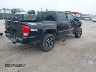 2017 Toyota Tacoma SR5 with VIN 5TFAZ5CN9HX043074, listed as a IAAI auction lot 41813109 with 137,335 mi miles and . Bid and sale history available at carsss.com. Image 4.