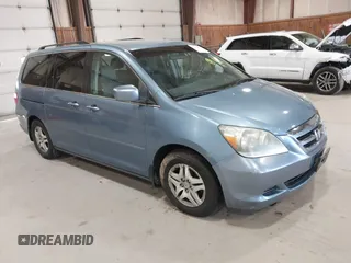 2006 Honda Odyssey EX with VIN 5FNRL38436B094358, listed as a IAAI auction lot 42143658 with 183,651 mi miles. Bid and sale history available at carsss.com. Image 1.