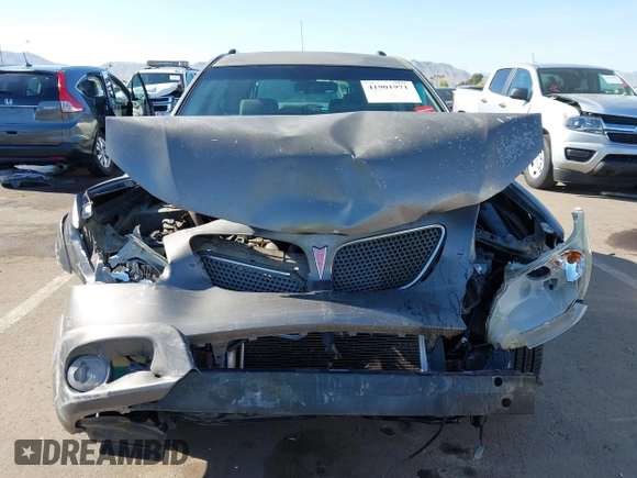 2005 Pontiac Vibe z VIN 5Y2SL638X5Z478773, wystawiony jako IAAI lot #41901971 z przebiegiem 202 443 mil mil oraz . Historia ofert i sprzedaży dostępna na DreamBid. Obrazek 6.
