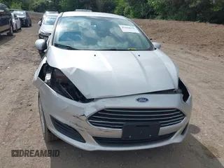 2019 Ford Fiesta S with VIN 3FADP4AJ9KM122597, listed as a IAAI auction lot 42264438 with 71,173 mi miles and . Bid and sale history available at DreamBid. Image 13.