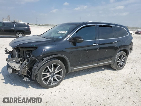 2020 Honda Pilot Touring 8-Passenger with VIN 5FNYF5H98LB013778, listed as a Copart auction lot 53112115 with 86,276 mi miles and Salvage Title. Bid and sale history available at DreamBid. Image 1.