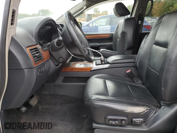 2010 Infiniti QX56 with VIN 5N3ZA0NE9AN902548, listed as a Copart auction lot 72955184 with 108,038 mi miles and Salvage Title. Bid and sale history available at carsss.com. Image 7.