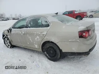 2009 Volkswagen Jetta S z VIN 3VWHM71KX9M075943, wystawiony jako Copart lot #88407595 z przebiegiem 171 244 mil mil oraz Szkoda całkowita • Salvage title. Historia ofert i sprzedaży dostępna na DreamBid. Obrazek 2.