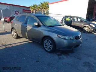 2011 Kia Forte 5-Door EX with VIN KNAFU5A2XB5417673, listed as a IAAI auction lot 41825573 with 129,811 mi miles. Bid and sale history available at carsss.com. Image 1.