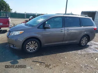 2015 Toyota Sienna XLE with VIN 5TDYK3DC9FS685768, listed as a IAAI auction lot 42062942 with 132,242 mi miles. Bid and sale history available at carsss.com. Image 14.