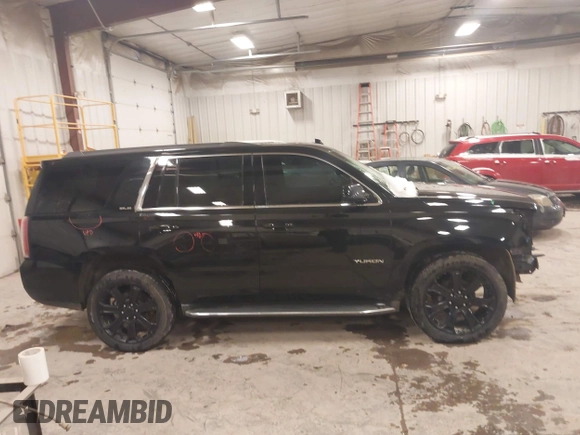 2016 GMC Yukon SLE with VIN 1GKS2AKC1GR276262, listed as a IAAI auction lot 41336378 with 213,182 mi miles. Bid and sale history available at carsss.com. Image 13.