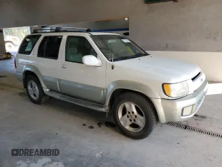 2001 Infiniti QX4 Luxury z VIN JNRDR09Y81W219674, wystawiony jako Copart lot #74221844 z przebiegiem 167 787 mil mil oraz Szkody całkowita. Historia ofert i sprzedaży dostępna na DreamBid. Obrazek 4.