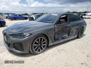 2023 BMW i4 eDrive40 with VIN WBY73AW00PFN90032, listed as a Copart auction lot 59993324 with 15,913 mi miles and Non Repairable. Bid and sale history available at carsss.com. Image 1.