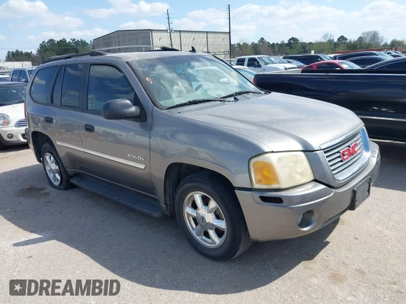 2006 GMC Envoy SLT with VIN 1GKDS13S462185122, listed as a IAAI auction lot 41778816 with 220,974 mi miles. Bid and sale history available at carsss.com. Image 1.