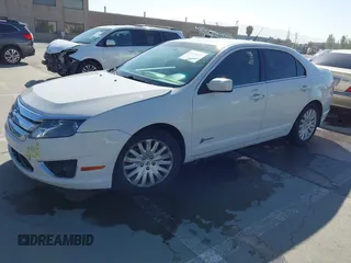 2012 Ford Fusion Hybrid z VIN 3FADP0L3XCR276182, wystawiony jako IAAI lot #42260450 z przebiegiem 133 567 mil mil oraz . Historia ofert i sprzedaży dostępna na DreamBid. Obrazek 2.