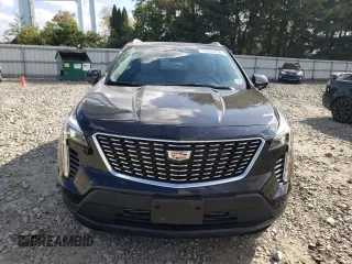 2023 Cadillac XT4 AWD Luxury with VIN 1GYFZBR49PF101377, listed as a Copart auction lot 73961294 with 26,847 mi miles and Salvage Title. Bid and sale history available at carsss.com. Image 5.