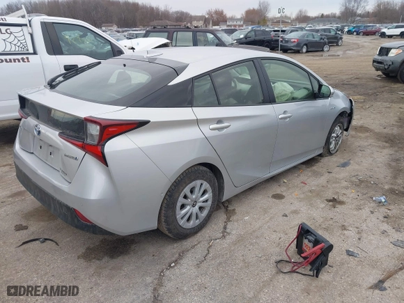 2019 Toyota Prius L Eco with VIN JTDKARFU4K3079789, listed as a IAAI auction lot 41897586 with 93,593 mi miles. Bid and sale history available at carsss.com. Image 4.
