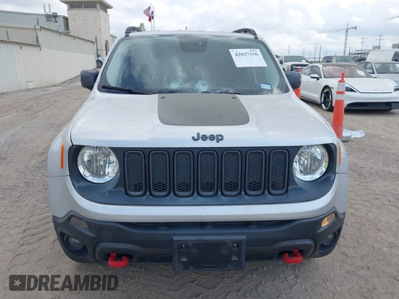 2017 Jeep Renegade Trailhawk with VIN ZACCJBCB6HPE63267, listed as a IAAI auction lot 42027156 with 64,899 mi miles and . Bid and sale history available at DreamBid. Image 12.