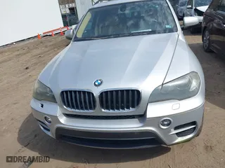2011 BMW X5 35i with VIN 5UXZV4C53BL403476, listed as a IAAI auction lot 41820844 with 104,472 mi miles. Bid and sale history available at carsss.com. Image 6.