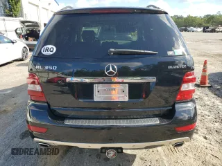 2011 Mercedes-Benz M 350 with VIN 4JGBB2FB5BA744077, listed as a Copart auction lot 61565615 with 125,813 mi miles and Salvage title. Bid and sale history available at DreamBid. Image 6.