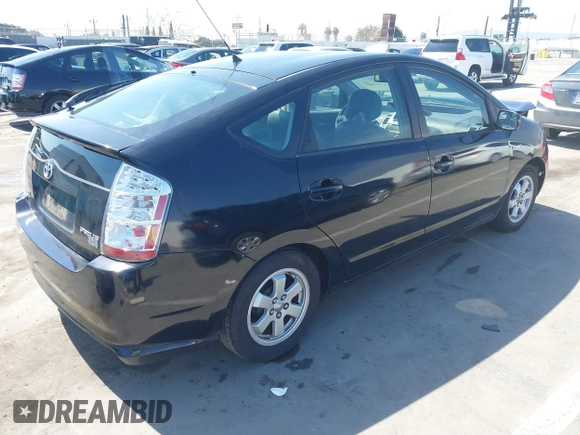 2007 Toyota Prius with VIN JTDKB20UX73228033, listed as a IAAI auction lot 41851668 with 242,138 mi miles. Bid and sale history available at carsss.com. Image 4.