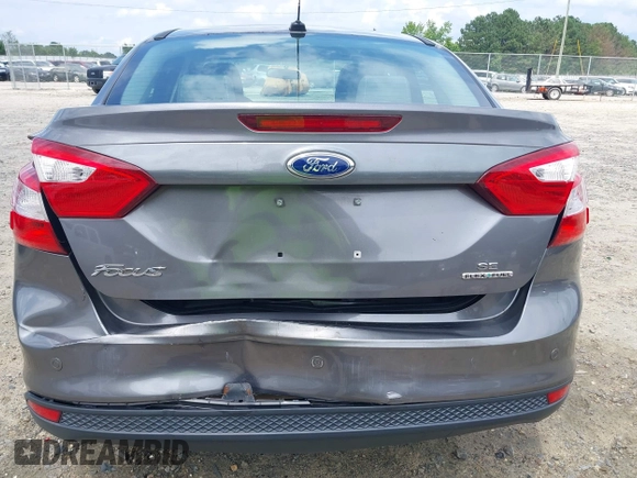 2013 Ford Focus SE z VIN 1FADP3F27DL267203, wystawiony jako IAAI lot #42470614 z przebiegiem 180 153 mil mil oraz . Historia ofert i sprzedaży dostępna na DreamBid. Obrazek 6.