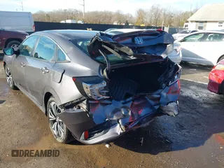 2017 Honda Civic Sedan EX-L with VIN 2HGFC1F70HH633263, listed as a IAAI auction lot 41511642 with 65,769 mi miles. Bid and sale history available at carsss.com. Image 6.