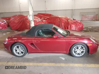2006 Porsche Boxster z VIN WP0CA29806S710303, wystawiony jako IAAI lot #42276368 z przebiegiem 73 796 mil mil oraz . Historia ofert i sprzedaży dostępna na DreamBid. Obrazek 13.
