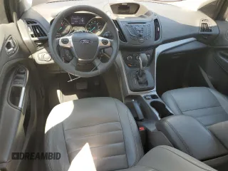 2015 Ford Escape SE z VIN 1FMCU0G76FUA49060, wystawiony jako Copart lot #58174495 z przebiegiem 50 148 mil mil oraz Szkoda całkowita • Salvage title. Historia ofert i sprzedaży dostępna na DreamBid. Obrazek 8.