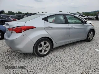 2013 Hyundai Elantra GLS с VIN 5NPDH4AE7DH352657, выставлен на аукционе Copart как лот 57814215 с пробегом 115 566 миль миль и Списание • Salvage title. История ставок и продаж доступна на DreamBid. Изображение 3.