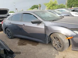 2021 Honda Civic LX z VIN 2HGFC2F64MH555769, wystawiony jako IAAI lot #41954218 z przebiegiem 58 785 mil mil oraz . Historia ofert i sprzedaży dostępna na DreamBid. Obrazek 14.
