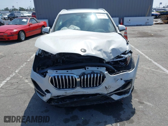 2020 BMW X1 xDrive28i with VIN WBXJG9C04L5R18165, listed as a IAAI auction lot 42313313 with 46,815 mi miles and . Bid and sale history available at DreamBid. Image 13.