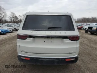 2022 Jeep Wagoneer Series III with VIN 1C4SJVDT3NS137548, listed as a Copart auction lot 46156735 with 19,731 mi miles and Salvage Title. Bid and sale history available at DreamBid. Image 6.