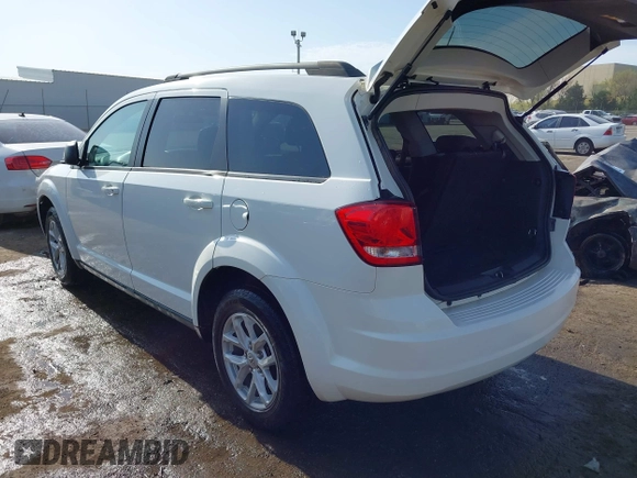 2014 Dodge Journey SE with VIN 3C4PDCAB0ET293641, listed as a IAAI auction lot 42001844 with 138,740 mi miles. Bid and sale history available at carsss.com. Image 3.