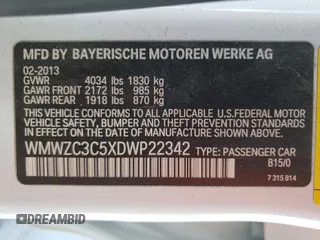 2013 MINI Countryman S with VIN WMWZC3C5XDWP22342, listed as a Copart auction lot 49702823 with 104,441 mi miles and Non repairable. Bid and sale history available at DreamBid. Image 13.