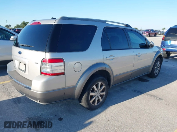2008 Ford Taurus X SEL z VIN 1FMDK02W48GA11501, wystawiony jako IAAI lot #42184768 z przebiegiem 247 428 mil mil oraz . Historia ofert i sprzedaży dostępna na DreamBid. Obrazek 4.