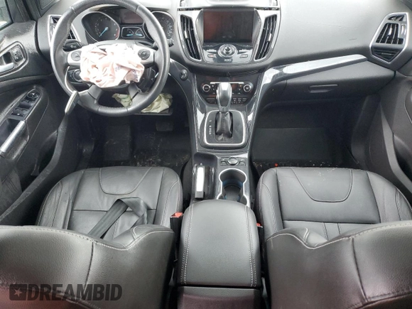2013 Ford Escape Titanium with VIN 1FMCU9J94DUB00695, listed as a Copart auction lot 56633955 with 129,011 mi miles and Salvage title. Bid and sale history available at DreamBid. Image 8.
