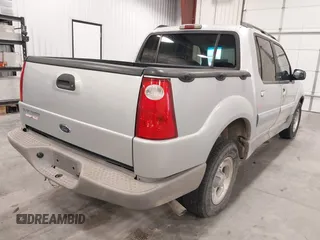 2002 Ford Explorer Sport Trac Value z VIN 1FMZU67E62UC06687, wystawiony jako IAAI lot #42436166 z przebiegiem 171 516 mil mil oraz . Historia ofert i sprzedaży dostępna na DreamBid. Obrazek 4.