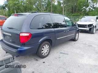 2007 Chrysler Town & Country Touring z VIN 2A4GP54L37R210162, wystawiony jako IAAI lot #42414404 z przebiegiem 276 516 mil mil oraz . Historia ofert i sprzedaży dostępna na DreamBid. Obrazek 4.