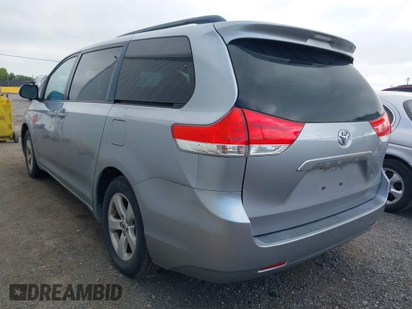 2012 Toyota Sienna LE AAS with VIN 5TDKK3DC1CS193107, listed as a IAAI auction lot 42068706 with 106,930 mi miles and . Bid and sale history available at DreamBid. Image 3.