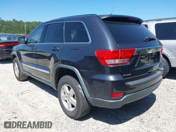 2012 Jeep Grand Cherokee Laredo with VIN 1C4RJEAG9CC223167, listed as a IAAI auction lot 42136098 with 152,715 mi miles. Bid and sale history available at carsss.com. Image 3.