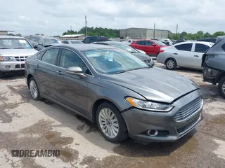 2013 Ford Fusion SE Hybrid with VIN 3FA6P0LU9DR247484, listed as a IAAI auction lot 42110685 with 202,531 mi miles. Bid and sale history available at carsss.com. Image 1.